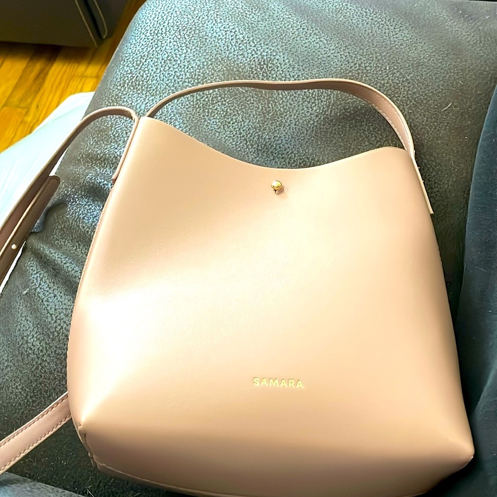 Samara light pink over the shoulder purse! Barley used! Fab Fit Fun collection.